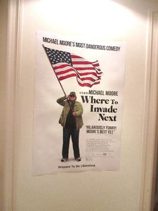 The Where To Invade Next poster on Michael Moore's door